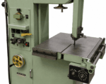 Work table and blade guide of the Dake-Johnson V-16 band saw with the feed control panel